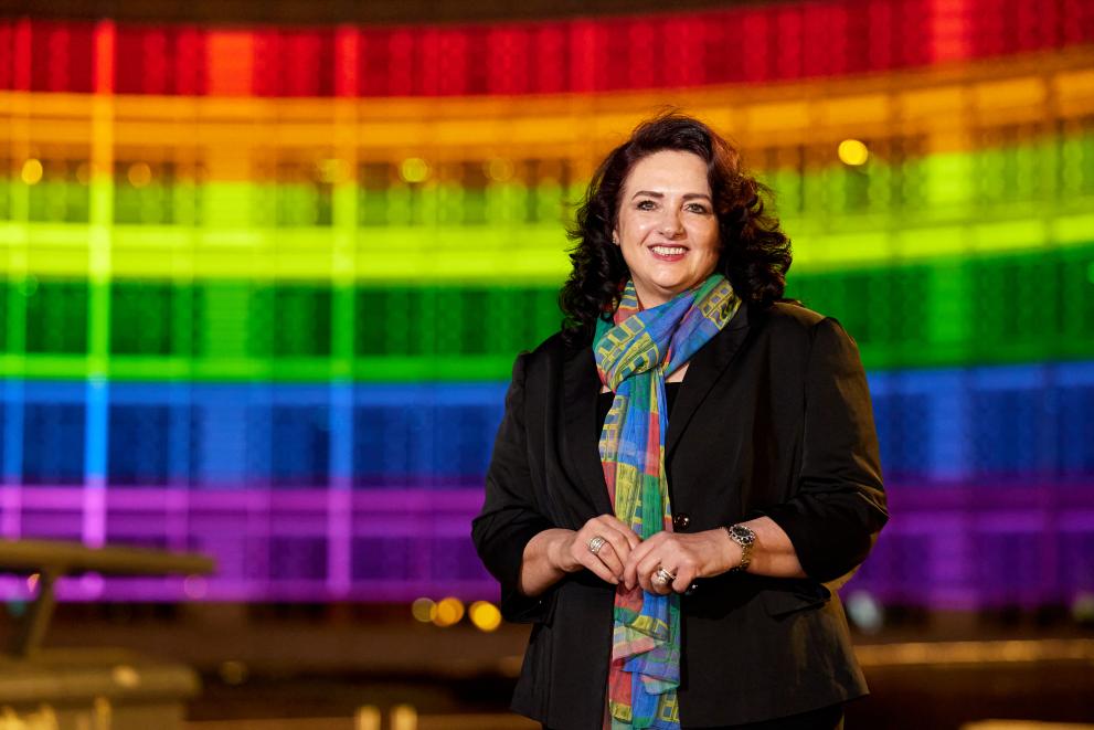 Helena Dalli, European Commissioner, with the Berlaymont building lit with rainbow colors as background on the occasion of International Day Against Homophobia, Transphobia and Biphobia (IDAHOT) 2022